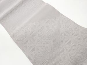 絽綴れ切り嵌め風花菱に幾何学模様名古屋帯